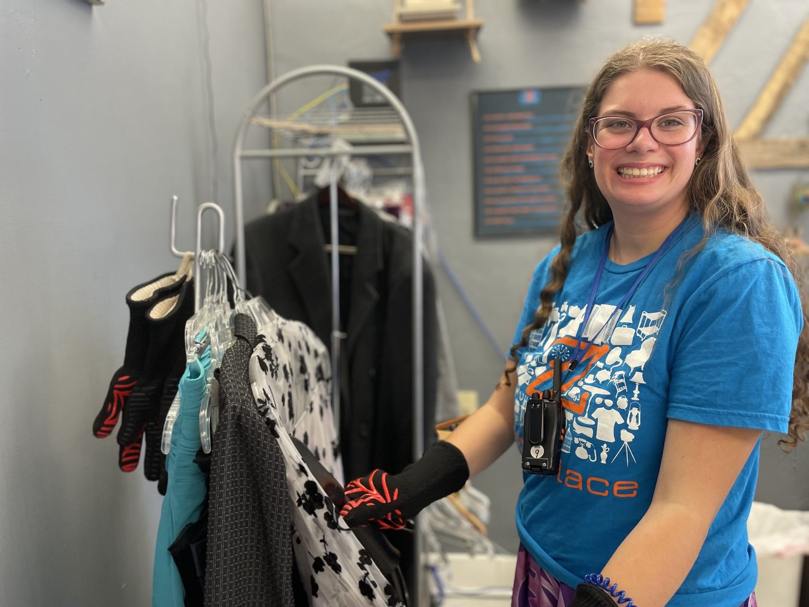 A ZABS Place Talent sorting clothing on the boutique floor